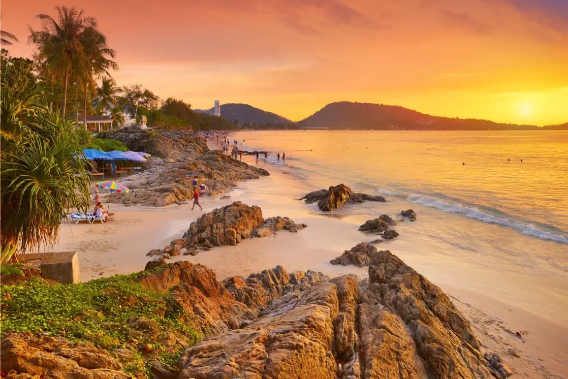 Person at turquoise water beach Phuket: the extraordinary outdoor life of the island