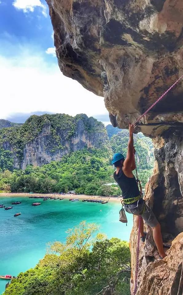 Limestone karst cliffs above turquoise sea at Railay Beach, Krabi