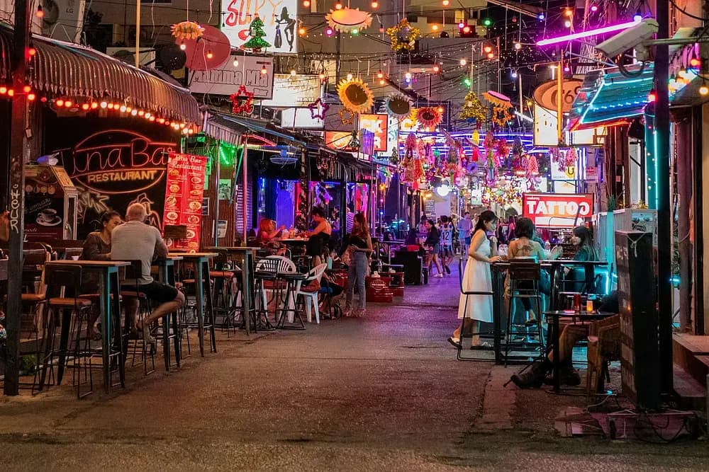 Relaxed bar terrace evening gathering friends: social life in Hua Hin